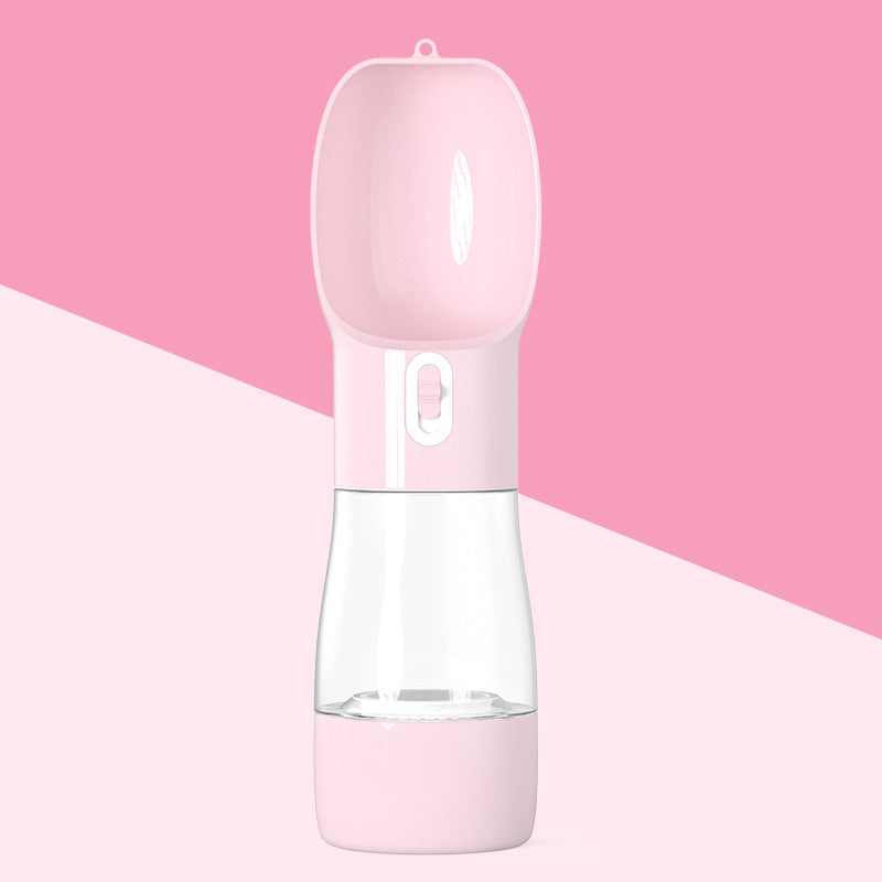 Pink water bottle with clear middle section on a pink background