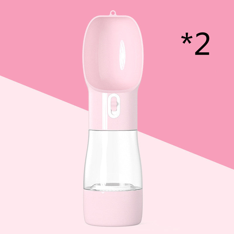 Pink water bottle with clear middle section on a pink background