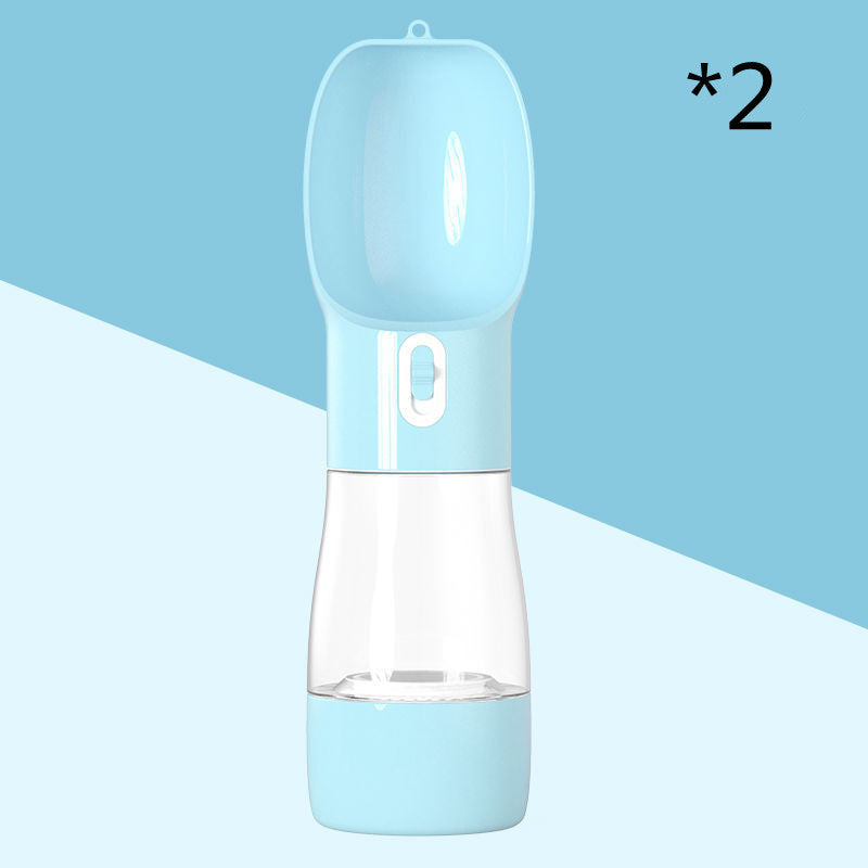 Blue and clear portable water bottle on a light blue background